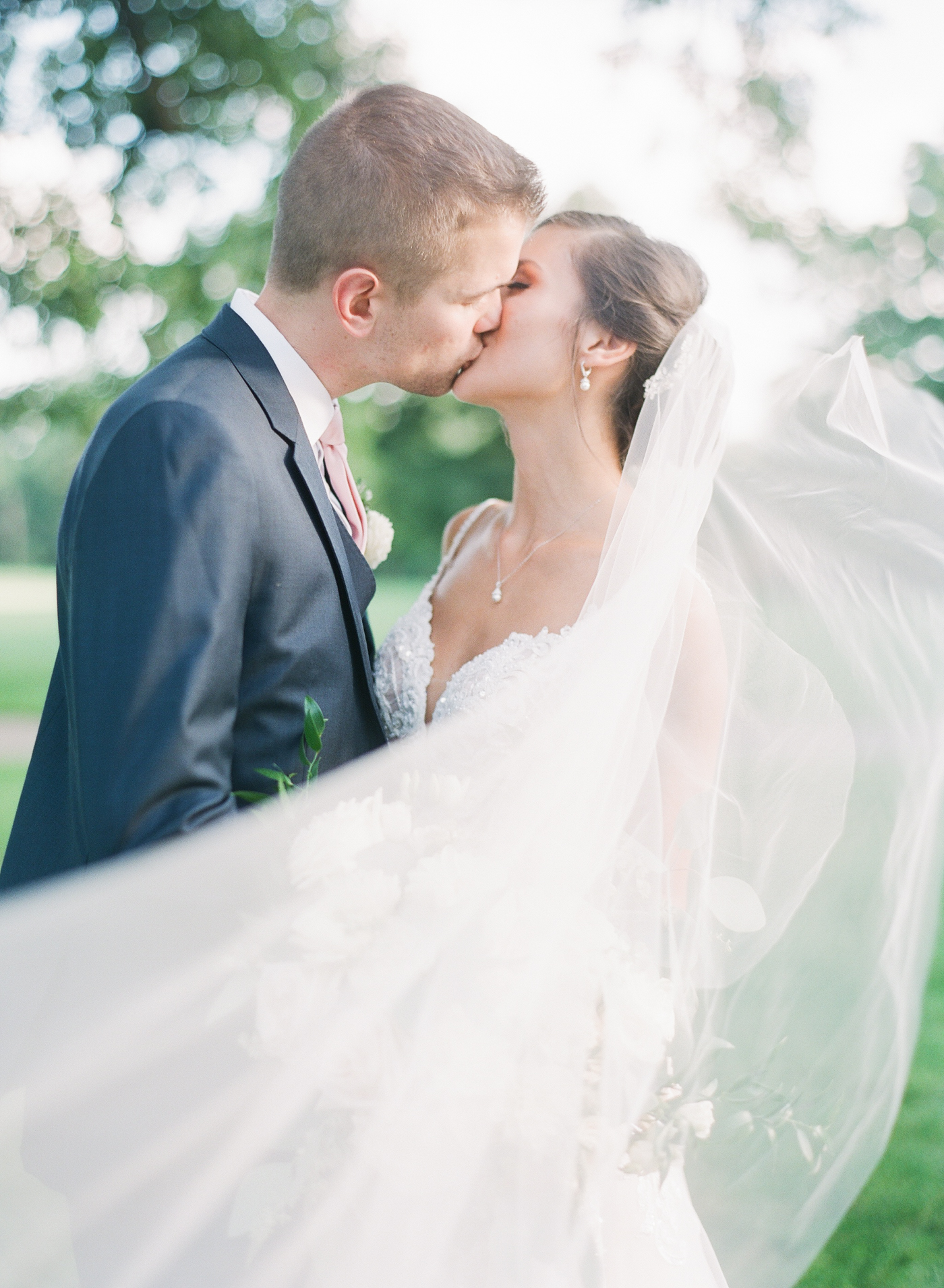 cleveland wedding, stan hywet wedding, film wedding photography, veil, kiss