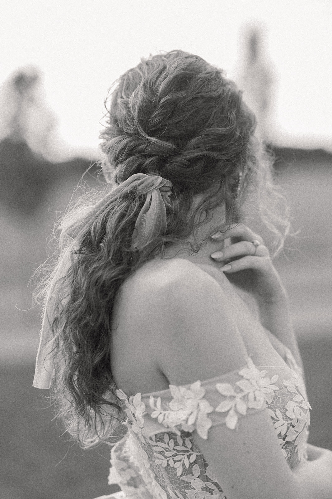 Bridal updo ponytail with ribbon